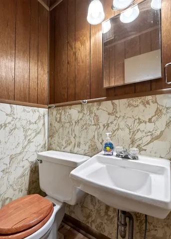 a room with lots of different colored cloths