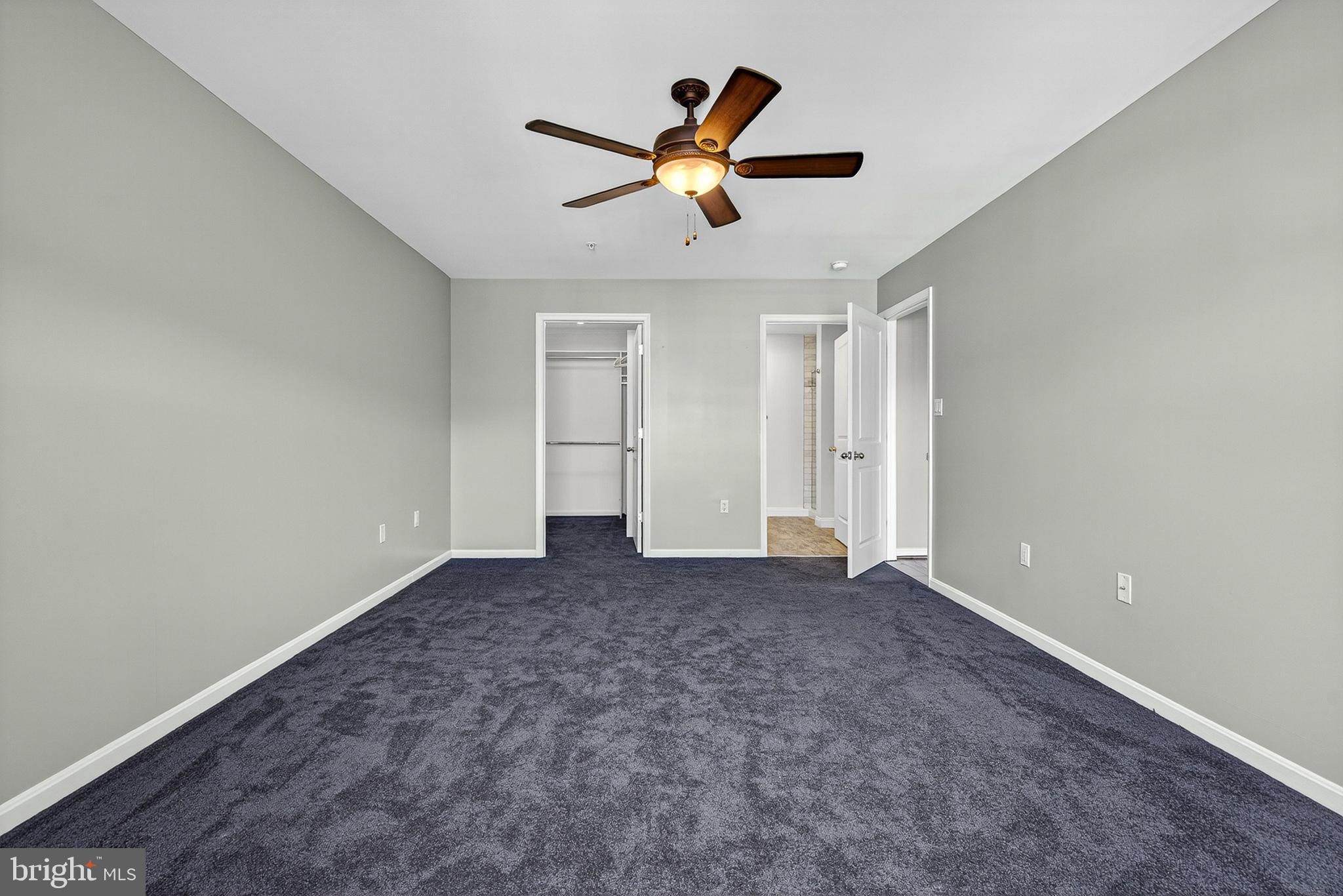 9500 Sidebrook Road, Unit 304 Owings Mills, MD 21117 - Photo 11 of 37 Primary Suite facing En Suite and Walk in Closet