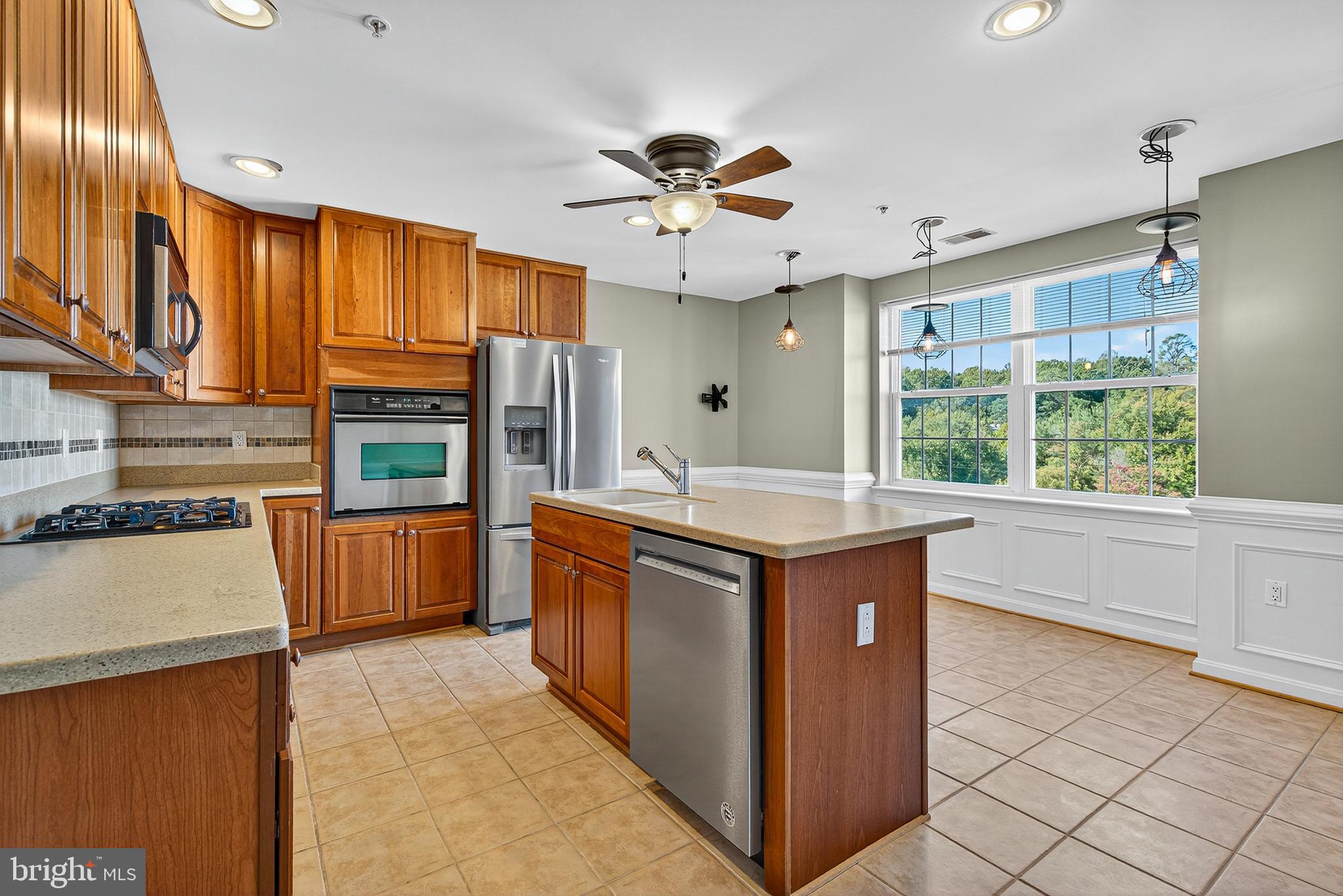 9500 Sidebrook Road, Unit 304 Owings Mills, MD 21117 - Photo 16 of 37 Kitchen with Stainless Steel Appliances