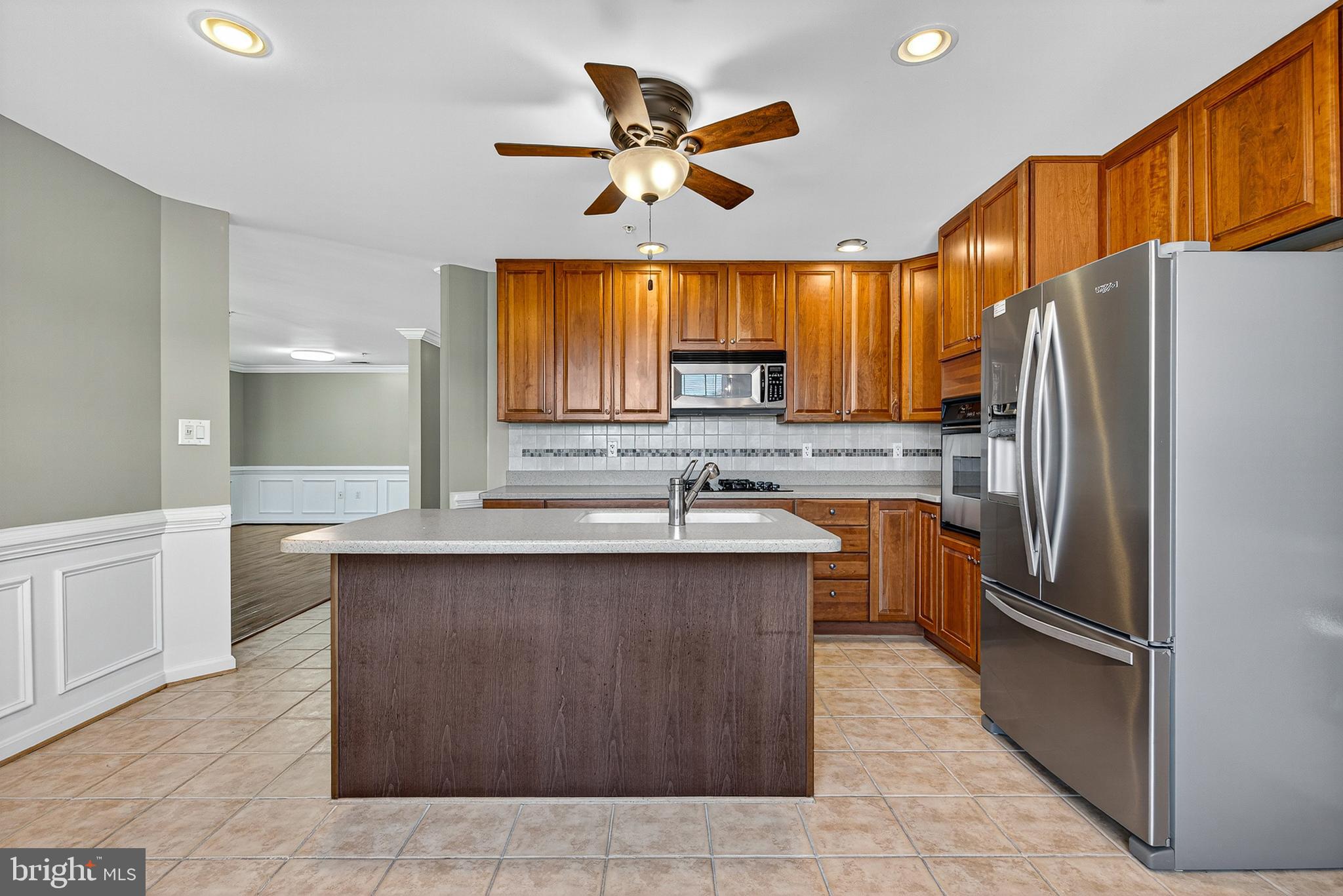 9500 Sidebrook Road, Unit 304 Owings Mills, MD 21117 - Photo 17 of 37 Island with Appliances