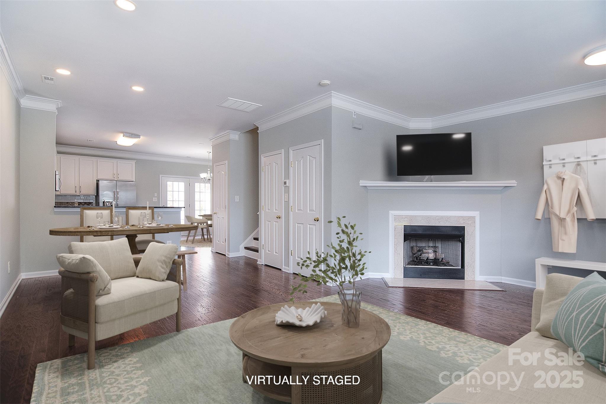 7002 Creft Circle Indian Trail, NC 28079 - Photo 1 of 47 a living room with furniture a fireplace and a flat screen tv