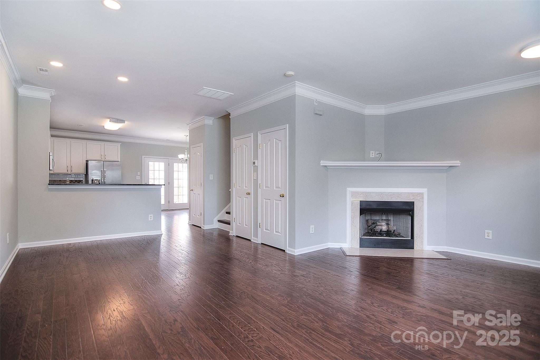 7002 Creft Circle Indian Trail, NC 28079 - Photo 2 of 47 a view of a kitchen with a sink and a fireplace