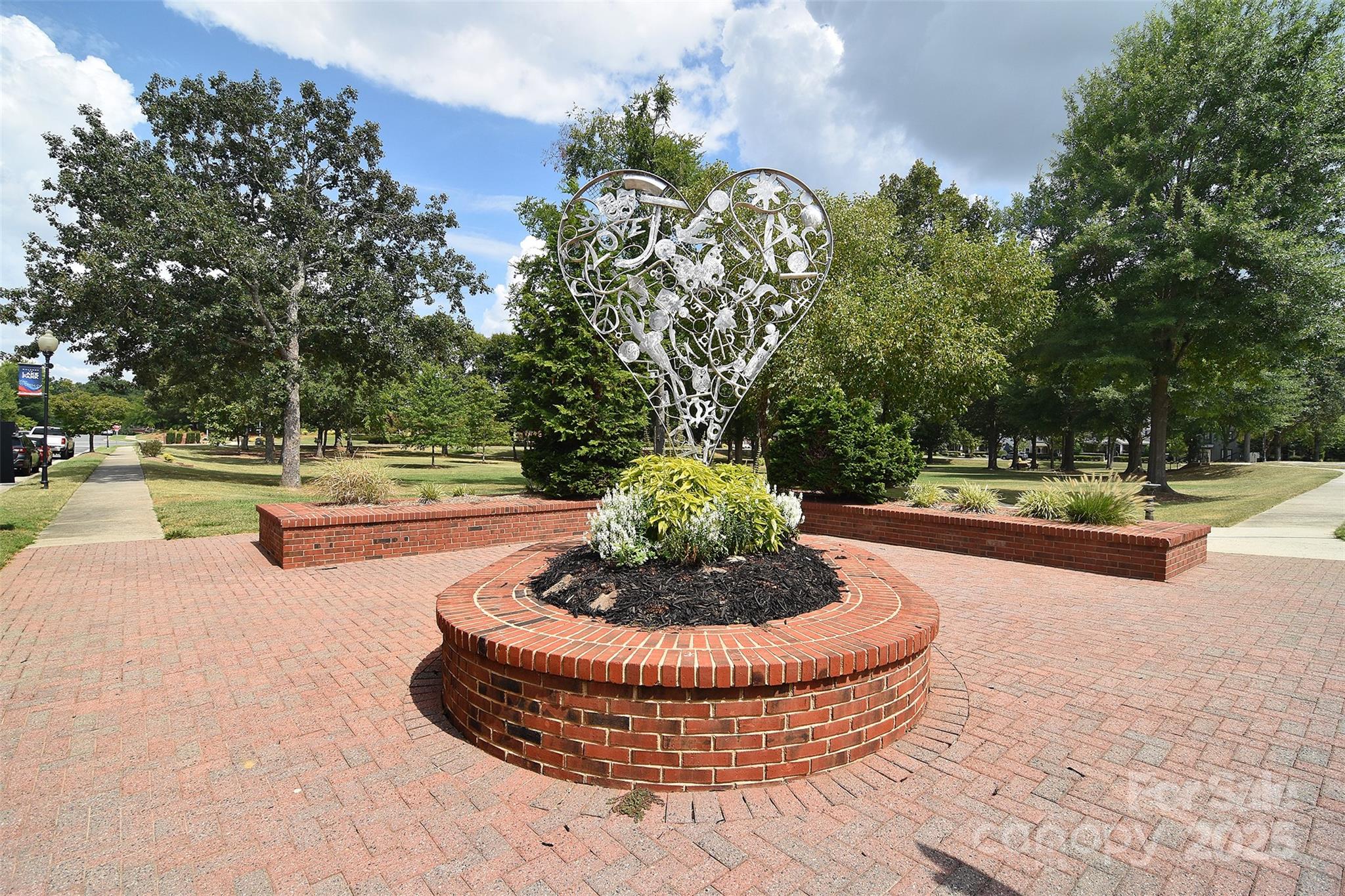 7002 Creft Circle Indian Trail, NC 28079 - Photo 36 of 47 a view of a swimming pool with a fountain in the background