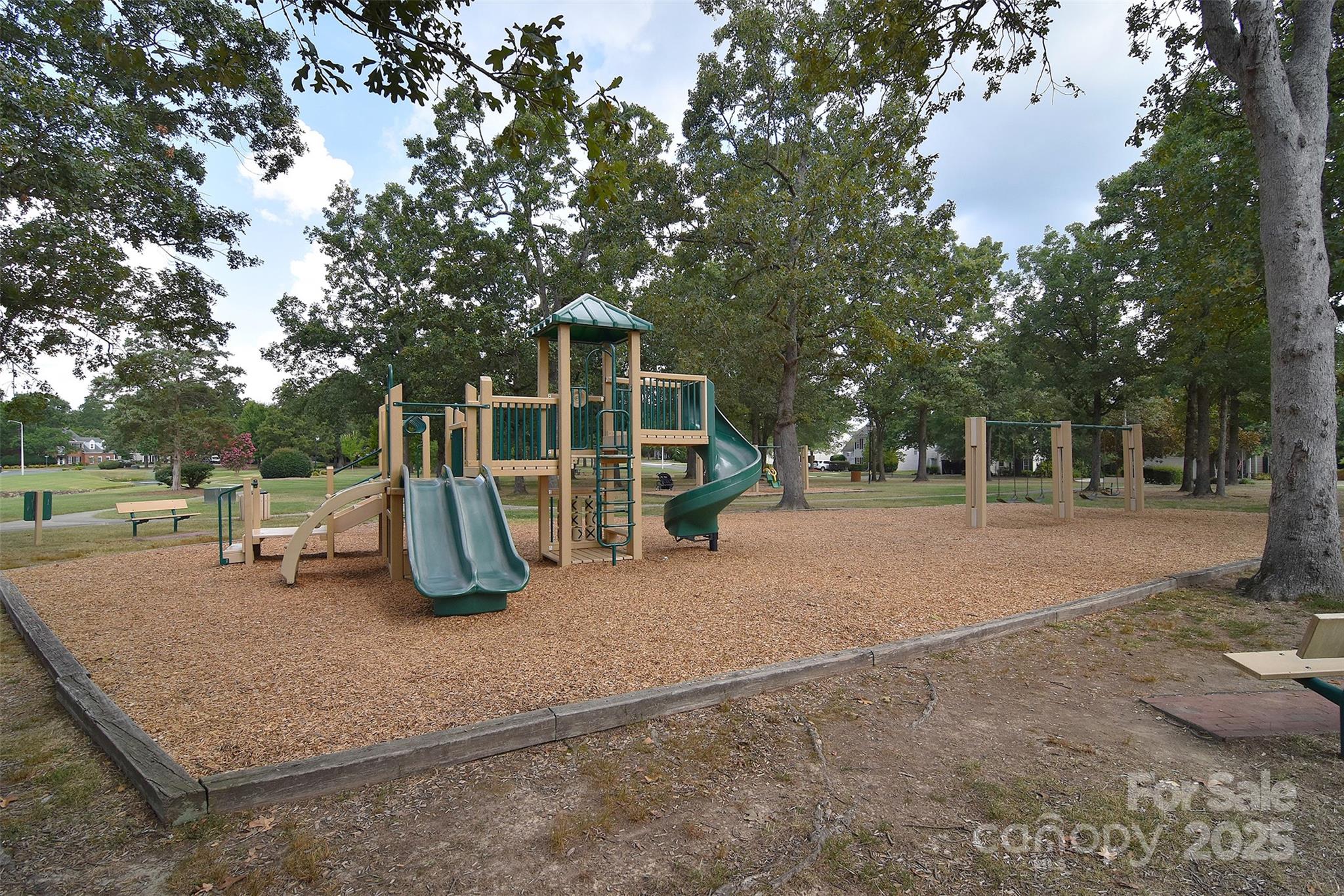 7002 Creft Circle Indian Trail, NC 28079 - Photo 44 of 47 a view of a park with slide