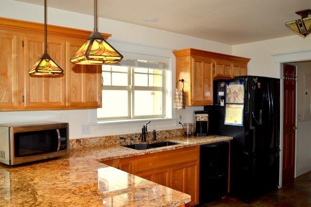 6535 Rockydale Road Cave Junction, OR 97523 - Photo 5 of 35 Beautiful open kitchen light and bright