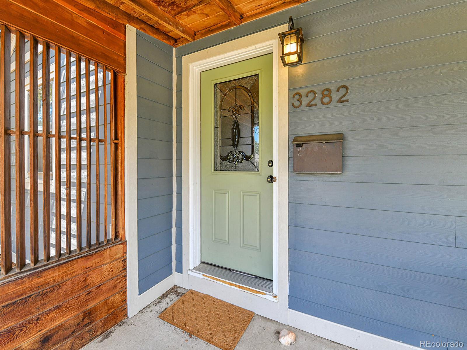 3282 Depew Street Wheat Ridge, CO 80212 - Photo 3 of 50 a view of a front door of the house