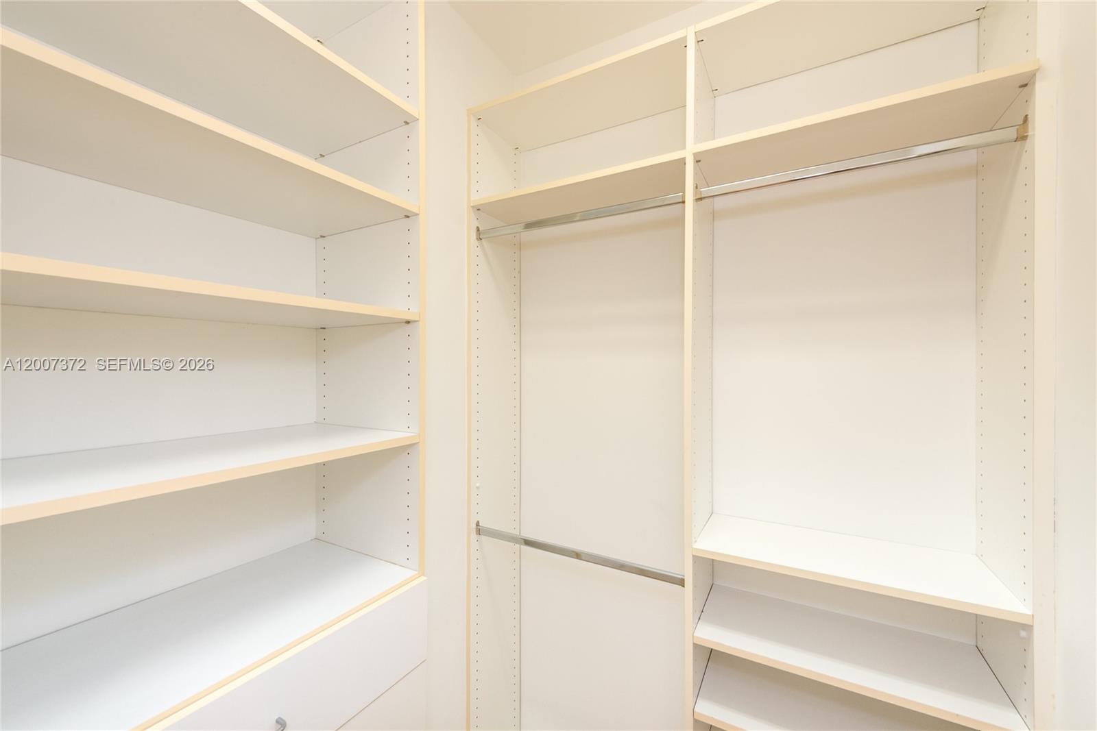 1643 Brickell Avenue, Unit 1103 Miami, FL 33129 - Photo 14 of 32 a view of an empty walk in closet