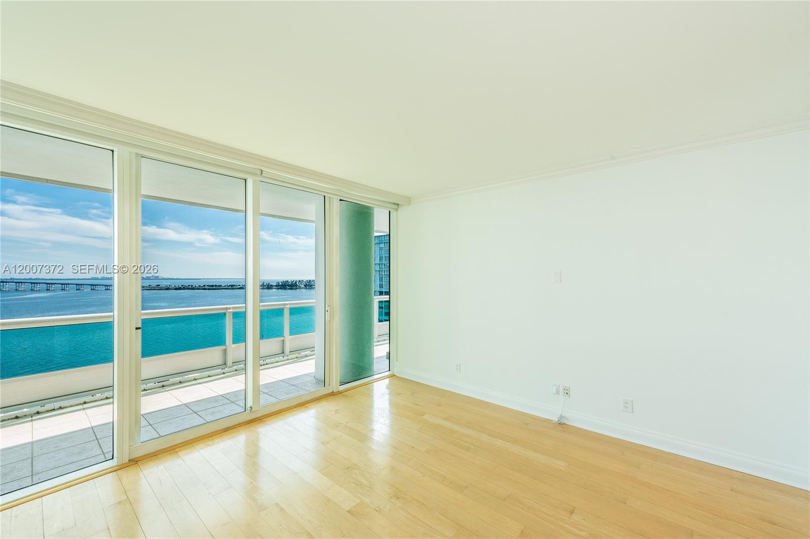 1643 Brickell Avenue, Unit 1103 Miami, FL 33129 - Photo 15 of 32 a view of an empty room with a window