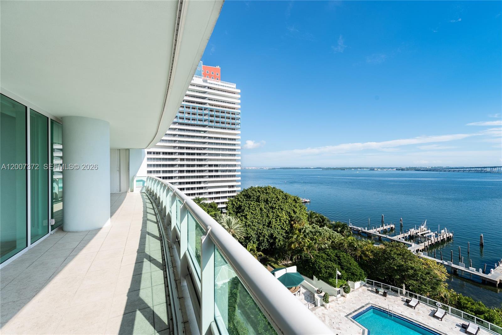 1643 Brickell Avenue, Unit 1103 Miami, FL 33129 - Photo 2 of 32 a balcony with outdoor seating and lake view
