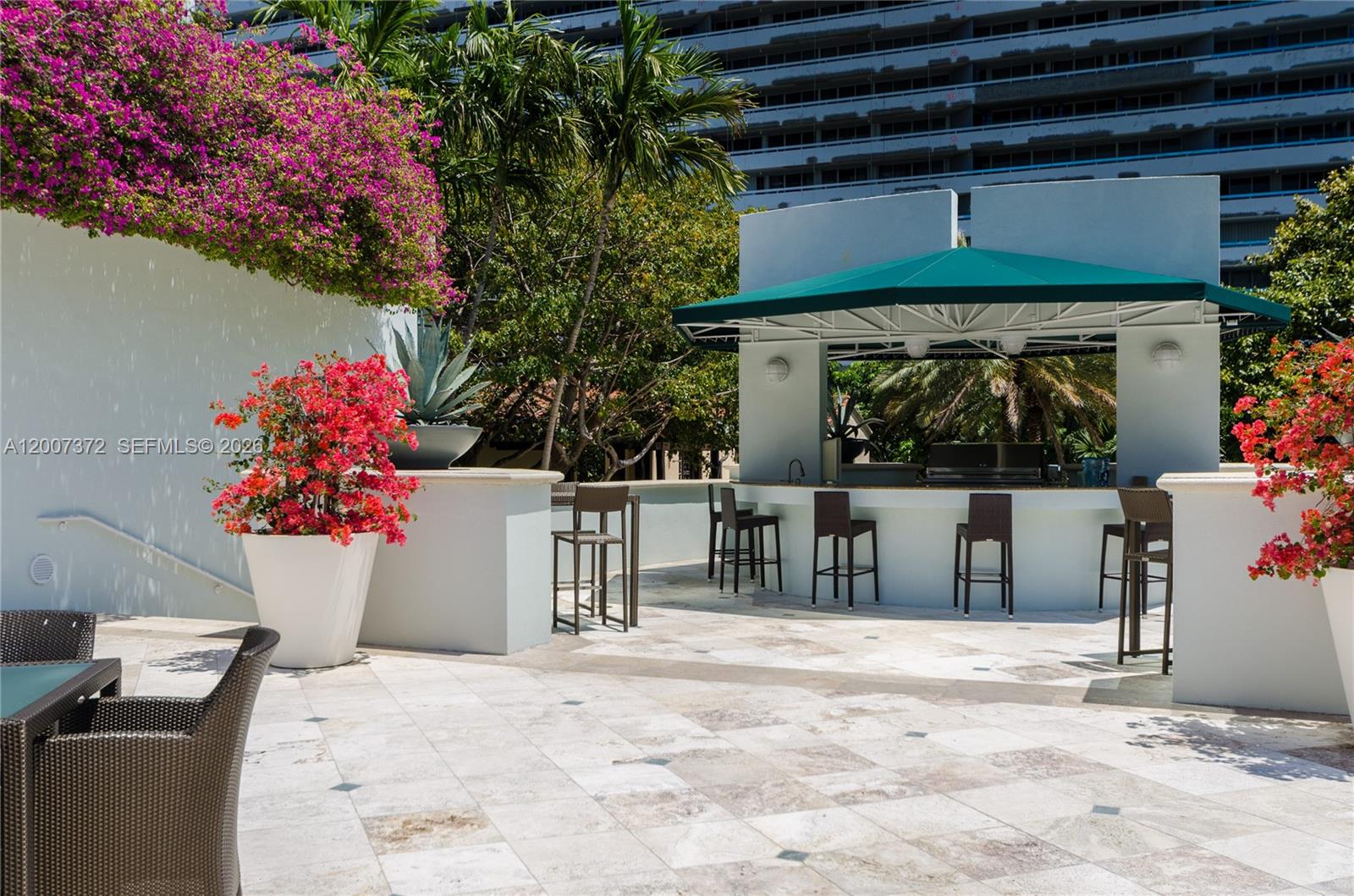 1643 Brickell Avenue, Unit 1103 Miami, FL 33129 - Photo 24 of 32 a view of a house with a patio
