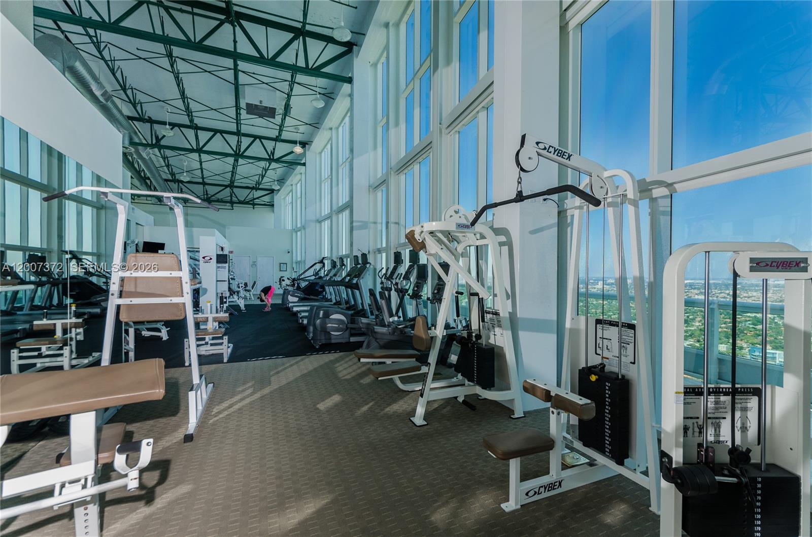 1643 Brickell Avenue, Unit 1103 Miami, FL 33129 - Photo 29 of 32 a view of a room with gym equipment