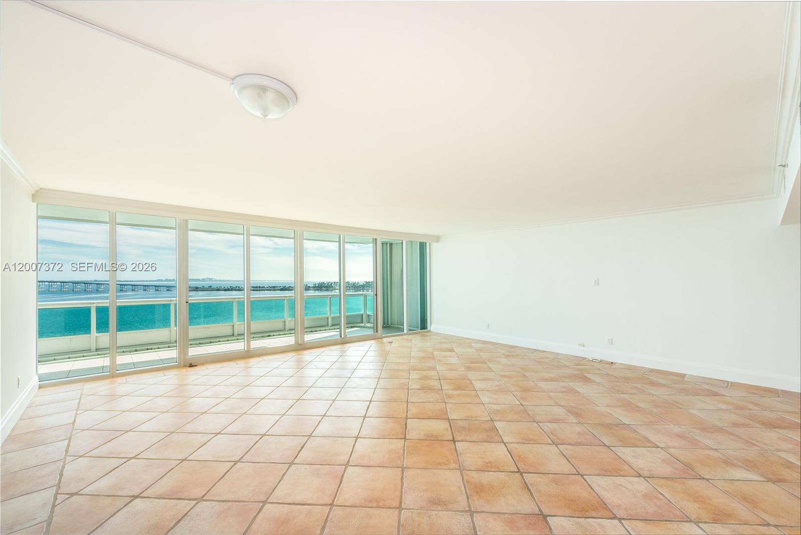 1643 Brickell Avenue, Unit 1103 Miami, FL 33129 - Photo 5 of 32 a view of an empty room and window