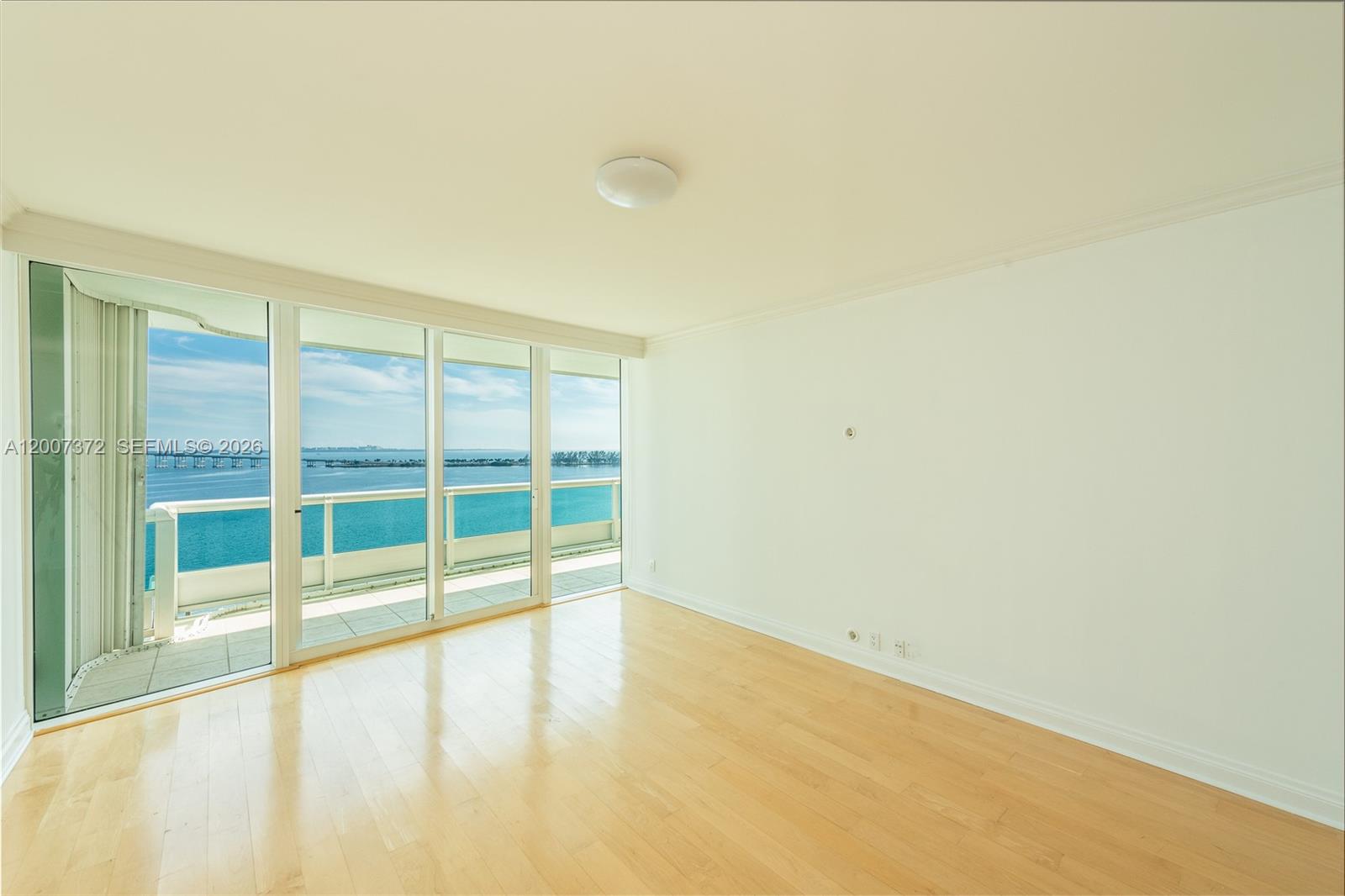 1643 Brickell Avenue, Unit 1103 Miami, FL 33129 - Photo 9 of 32 a view of an empty room with a window