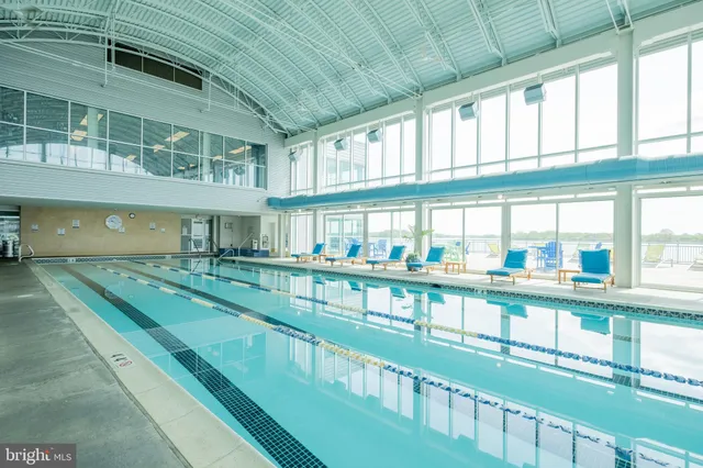 a view of an swimming pool with a porch
