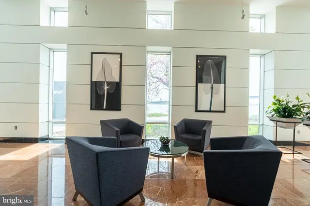 a front view of a building with garden