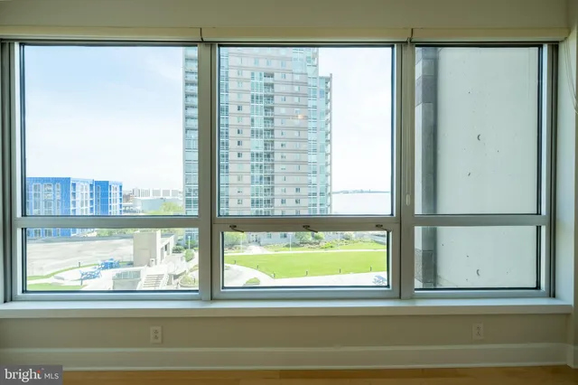 a view of a glass door and a window