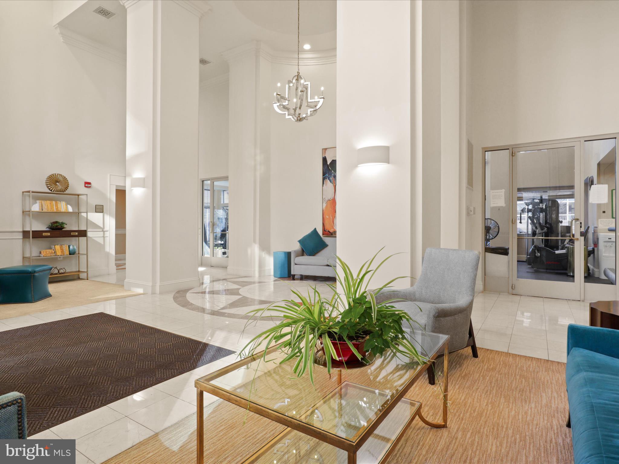 3830 9th Street North, Unit PH3E Arlington, VA 22203 - Photo 2 of 44 a living room with furniture and a table