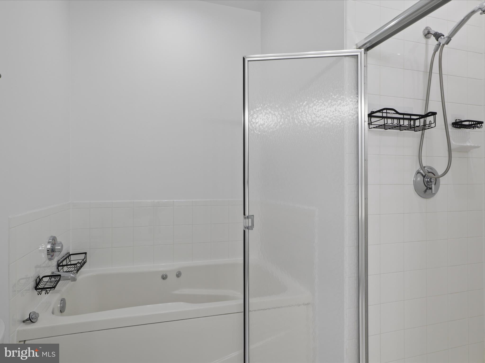 3830 9th Street North, Unit PH3E Arlington, VA 22203 - Photo 29 of 44 a bathroom with a shower and a bathtub