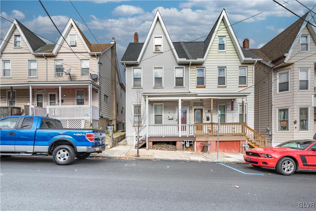 911 Spring Garden Street Easton, PA 18042 - Photo 1 of 48 a car parked in front of a house