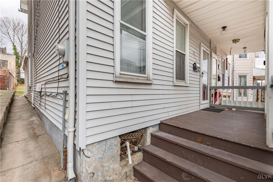 911 Spring Garden Street Easton, PA 18042 - Photo 2 of 48 a view of a patio with wooden floor and a large tree