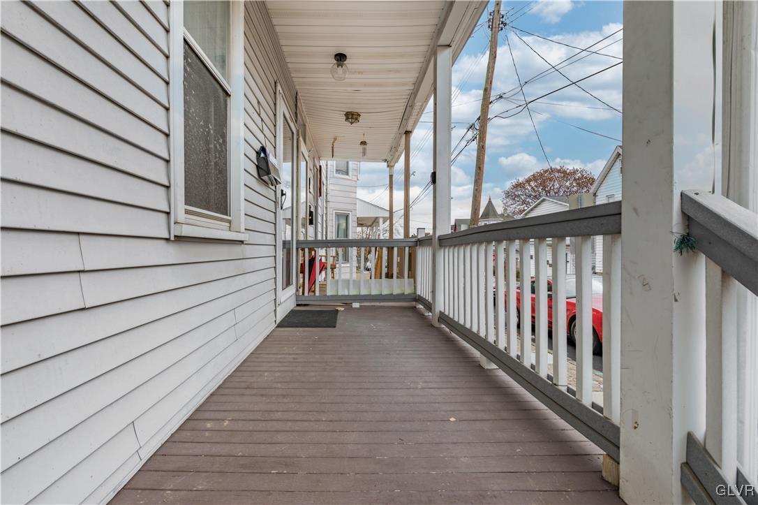 911 Spring Garden Street Easton, PA 18042 - Photo 3 of 48 a view of a balcony with wooden floor