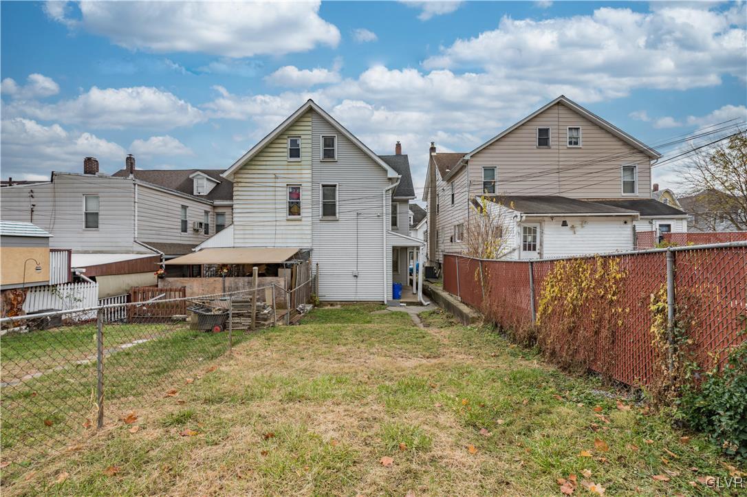 911 Spring Garden Street Easton, PA 18042 - Photo 44 of 48 a view of a house with a yard and sitting area
