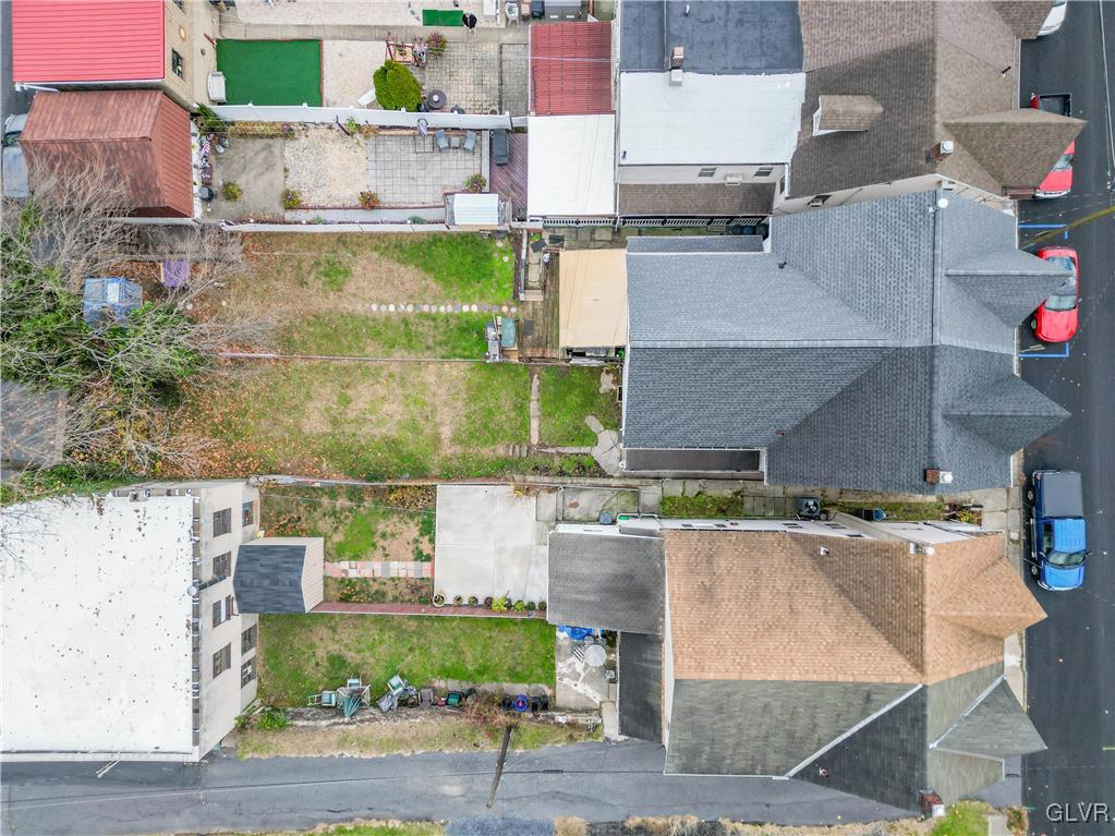 911 Spring Garden Street Easton, PA 18042 - Photo 46 of 48 an aerial view of residential houses with outdoor space and parking