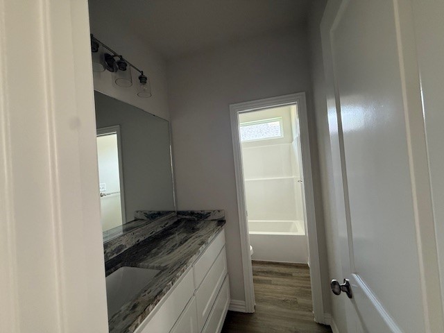 2602 Falcon Ridge Drive Bryan, TX 77803 - Photo 8 of 15 a bathroom with a granite countertop sink and a mirror