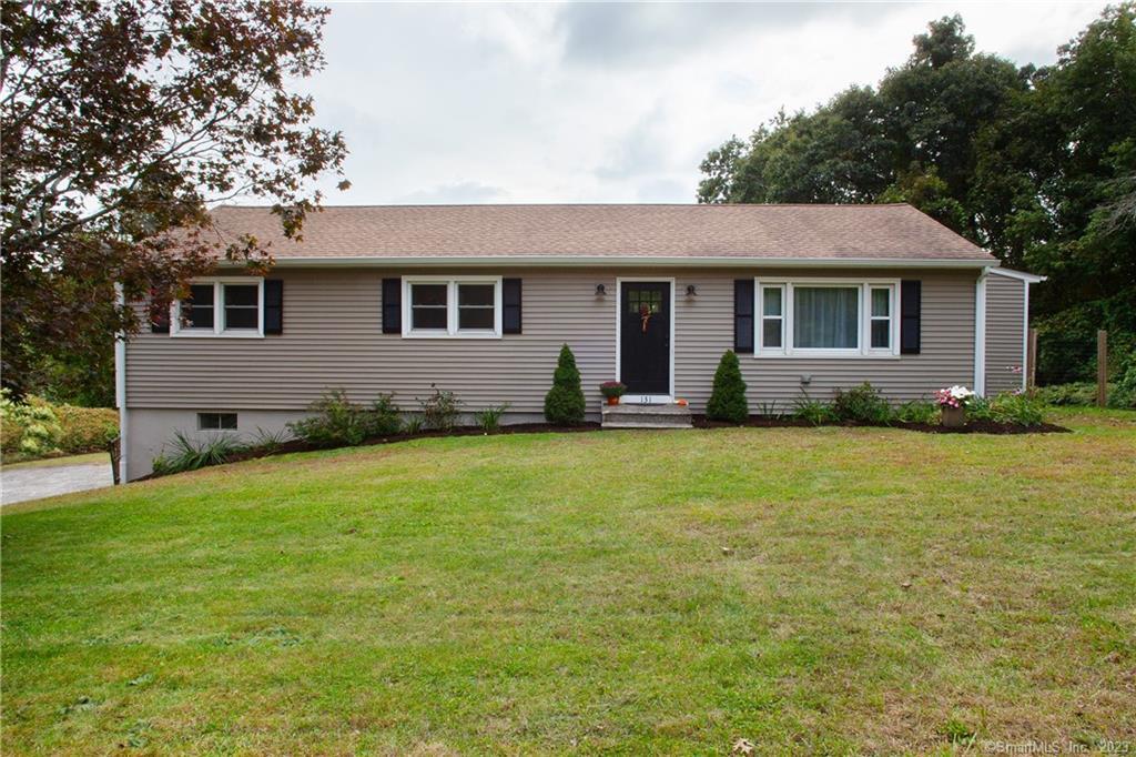 131 Scoville Hill Road Harwinton, CT 06791 - Photo 1 of 1 a front view of house with yard and trees in the background