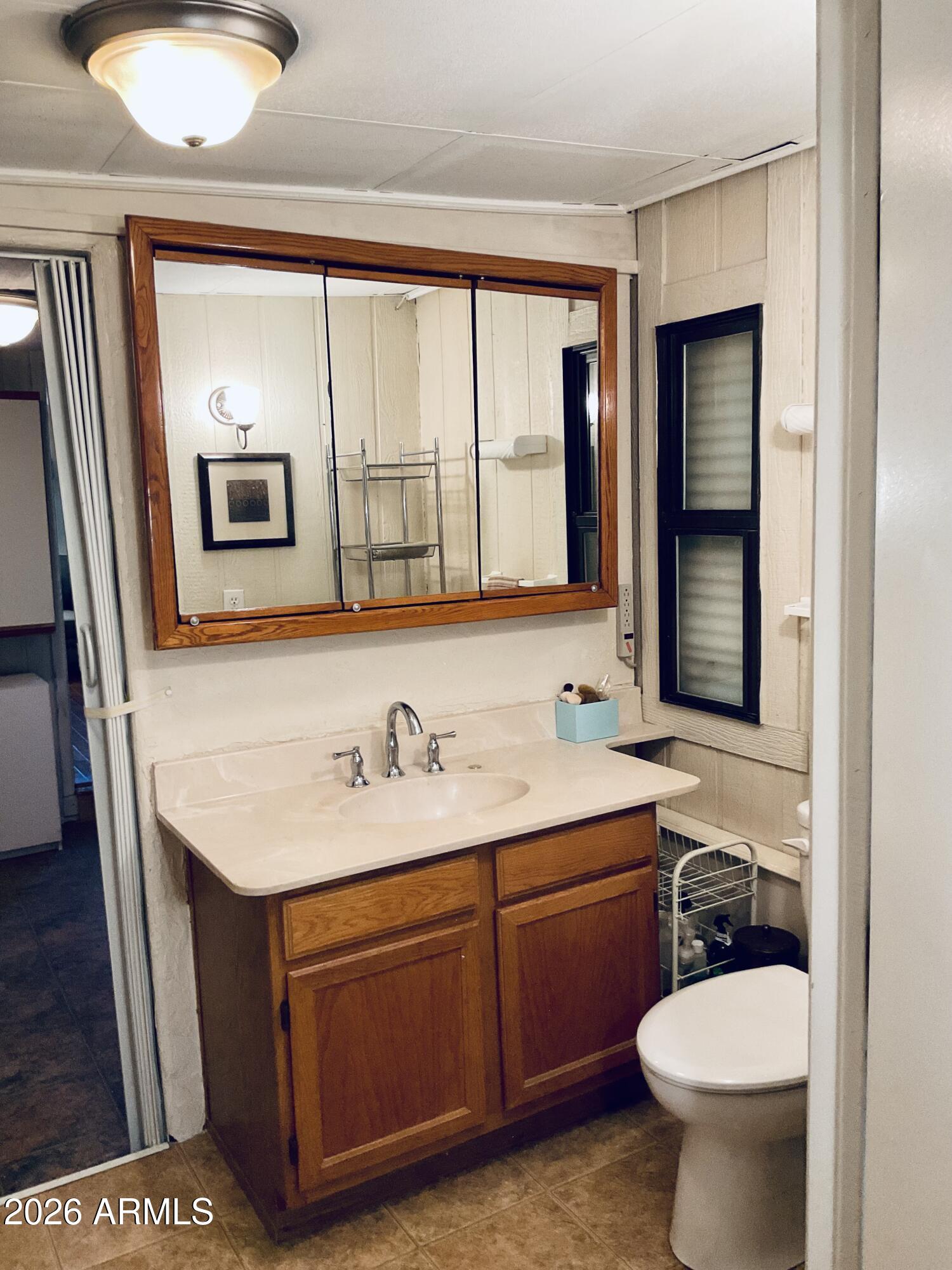 3036 East Utopia Road, Unit 52 Phoenix, AZ 85050 - Photo 20 of 36 Half Bath off Bonus Room
