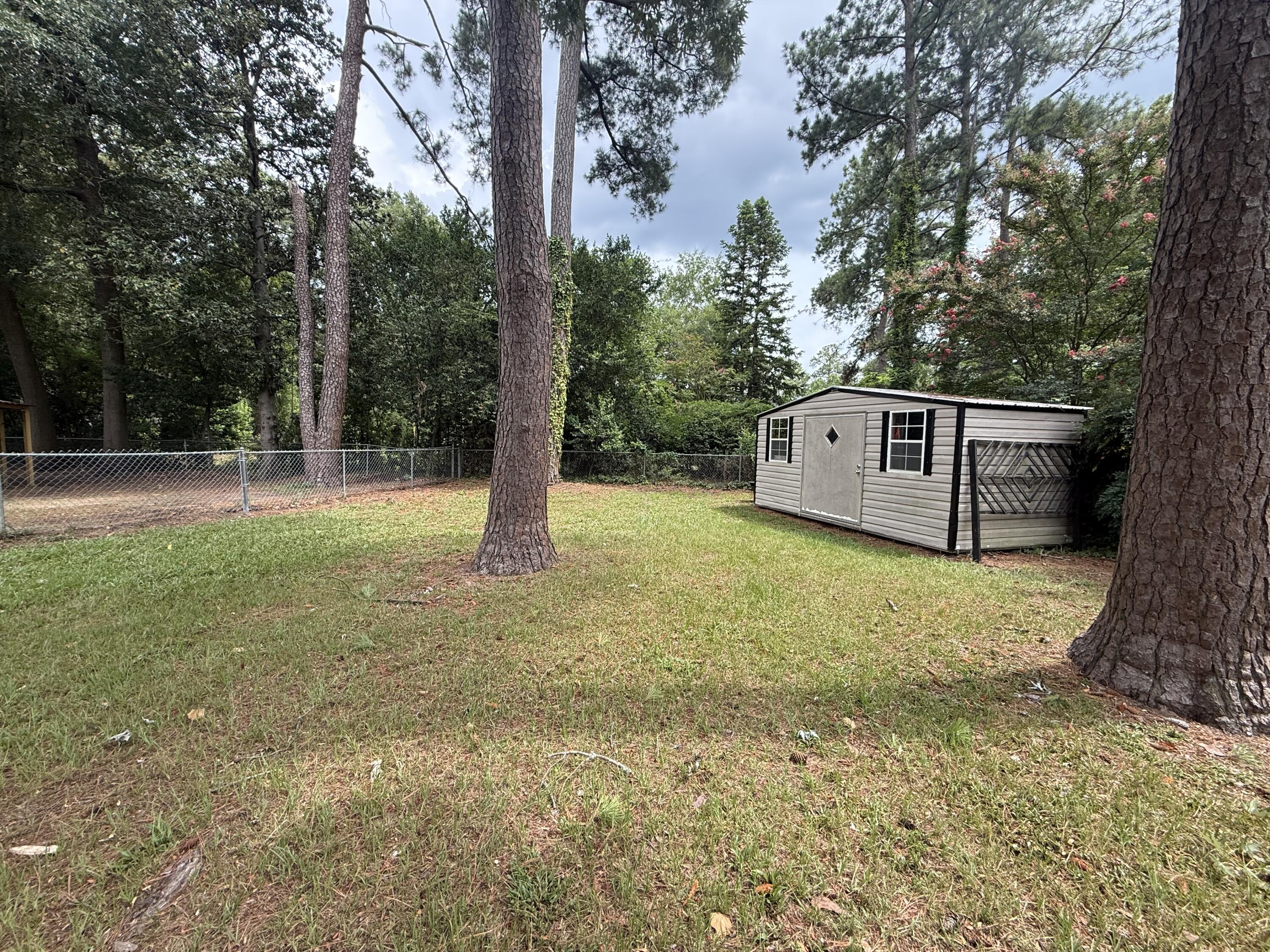 31 Riley Street Sumter, SC 29150 - Photo 11 of 65 fenced back yard and storage shed