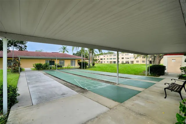 a view of swimming pool with a patio