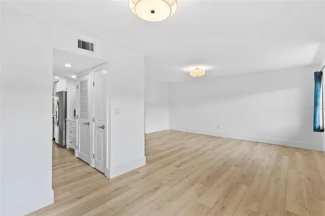 a view of a livingroom with wooden floor