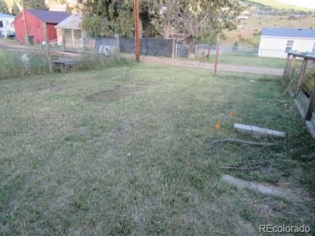 210 South 2nd Street Victor, CO 80860 - Photo 23 of 23 a backyard of apartments with large trees