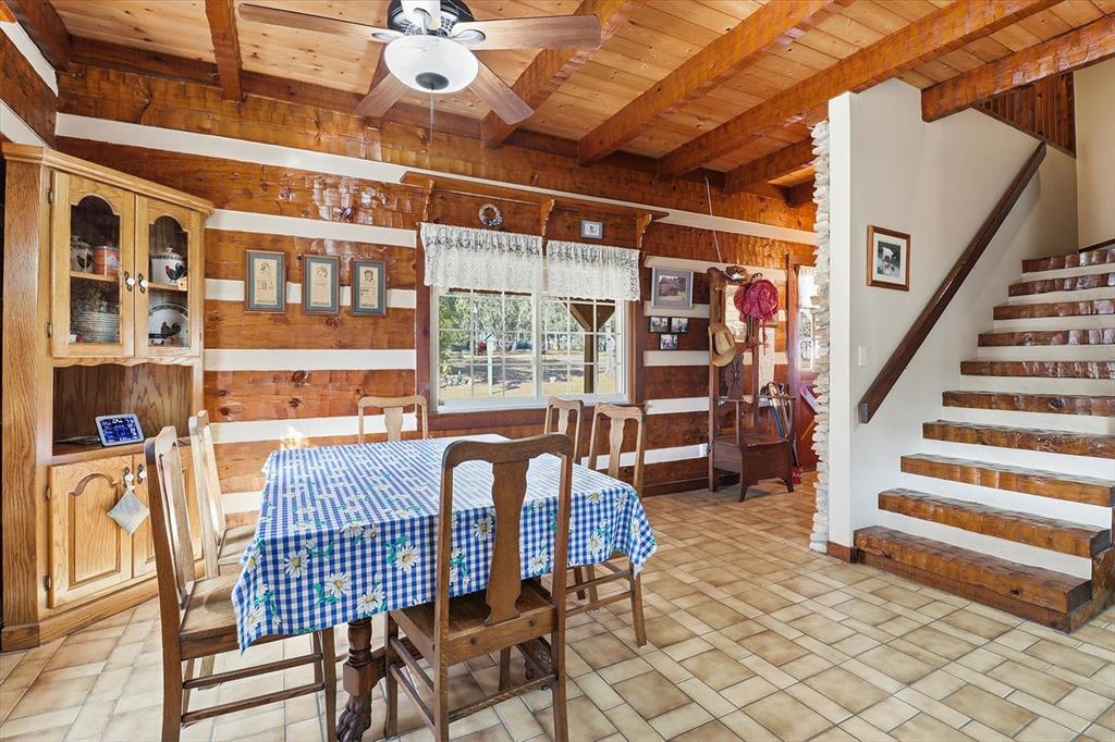 7310 South Irma Point Lecanto, FL 34461 - Photo 12 of 48 a view of a dining room with furniture and entryway