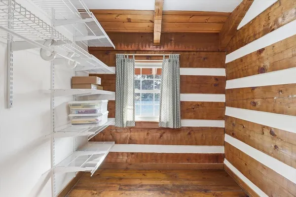 a bathroom with a shower and a toilet