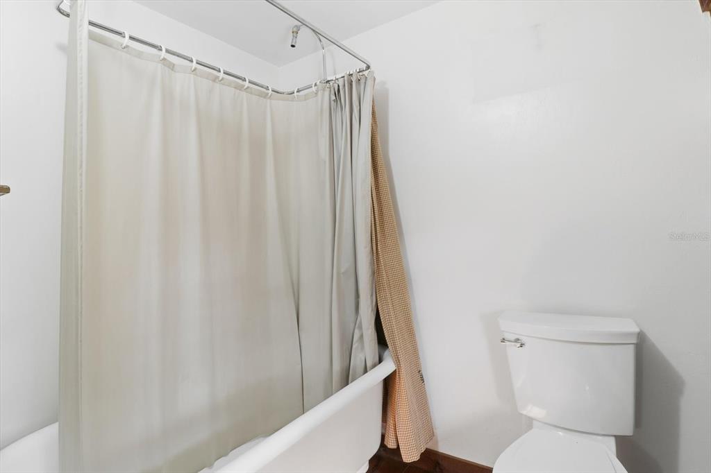 7310 South Irma Point Lecanto, FL 34461 - Photo 23 of 48 a bathroom with a shower and a toilet