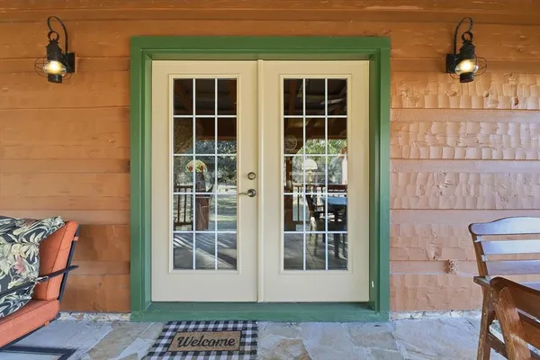 a view of a porch with furniture