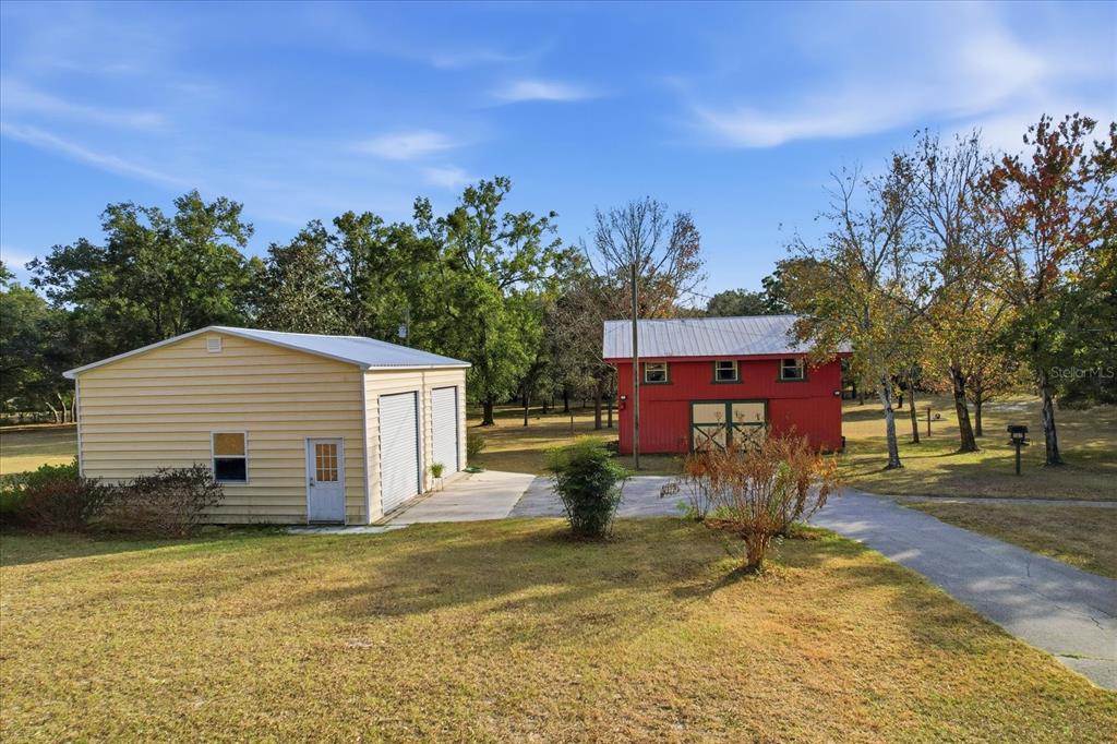 7310 South Irma Point Lecanto, FL 34461 - Photo 41 of 48 a view of a house with a yard