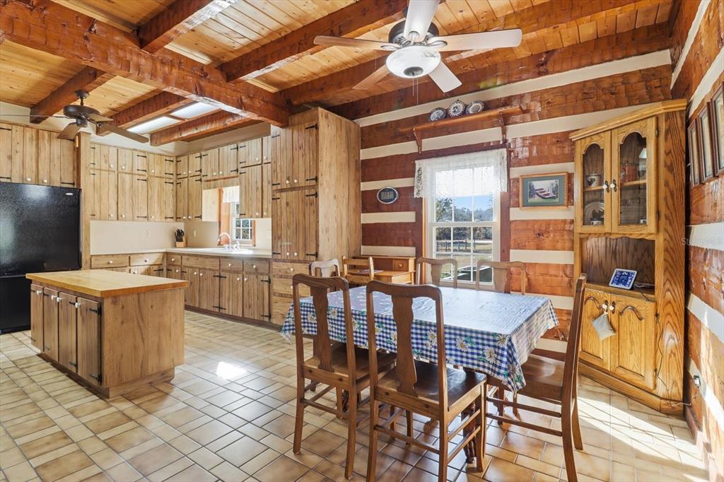 7310 South Irma Point Lecanto, FL 34461 - Photo 6 of 48 a view of a dining room with furniture window and outside view