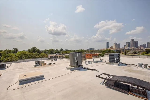 an outdoor sitting area with furniture