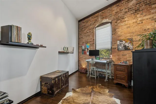 a workspace with furniture and a window