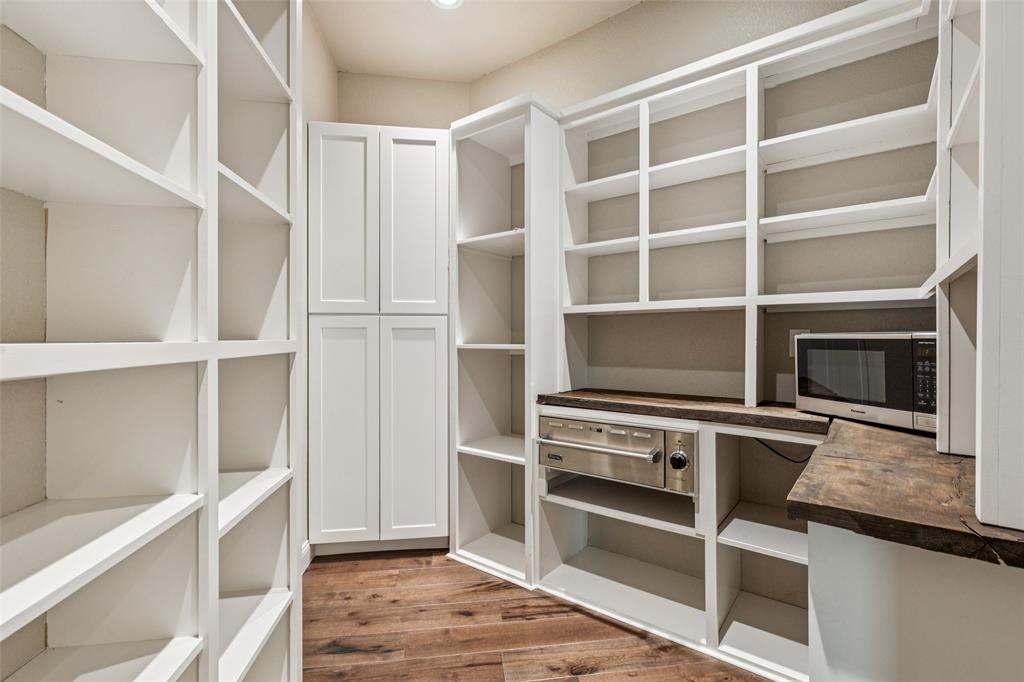 12877 Foutch Road Pilot Point, TX 76258 - Photo 17 of 40 a view of an empty walk in closet