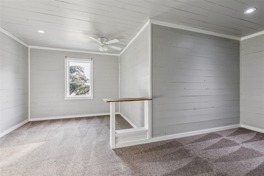 12877 Foutch Road Pilot Point, TX 76258 - Photo 31 of 40 an empty room with a empty space and window