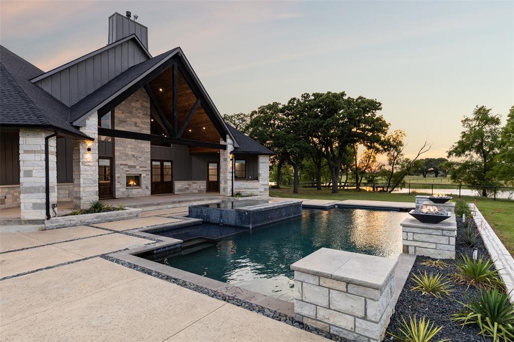 12877 Foutch Road Pilot Point, TX 76258 - Photo 40 of 40 a view of a patio with chairs next to a yard