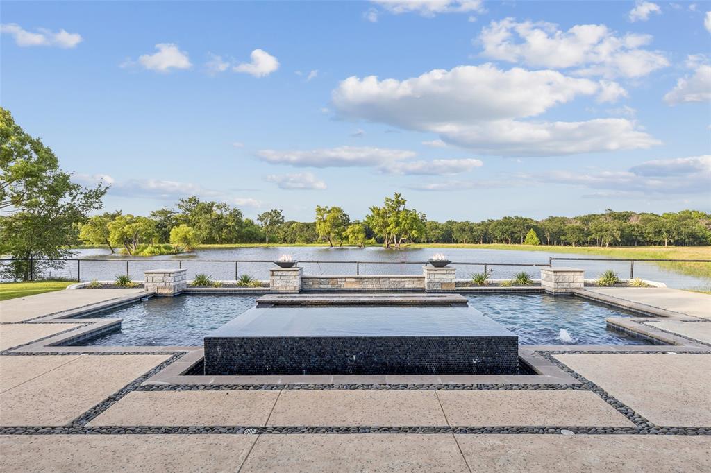 12877 Foutch Road Pilot Point, TX 76258 - Photo 6 of 40 a view of a swimming pool and a yard