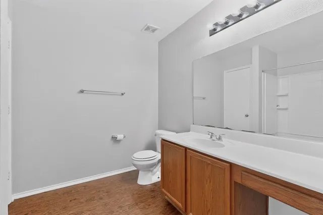 a bathroom with a sink and a large mirror
