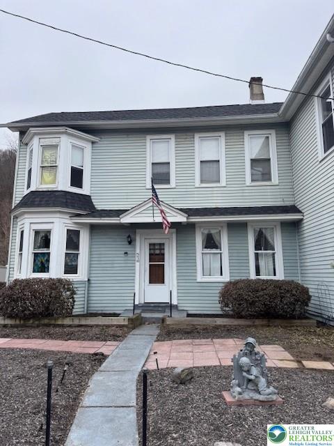 570 Slateford Road Mount Bethel, PA 18343 - Photo 1 of 10 a front view of a house with garden
