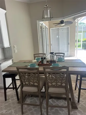 a view of a dining room with furniture