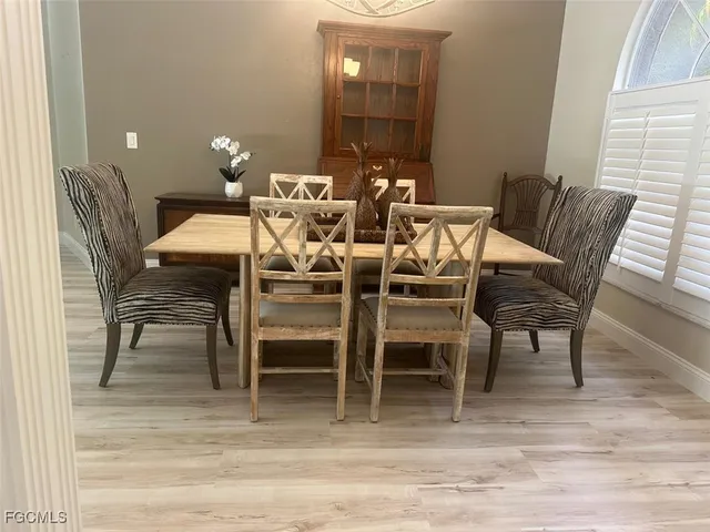 a view of a dining room with furniture